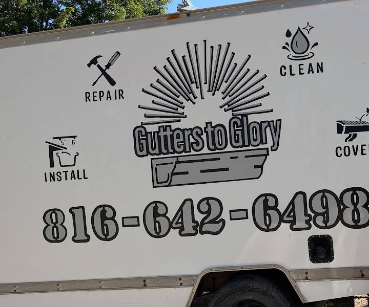 Gutters to Glory service truck with the company logo and phone number, cropped to remove a person.